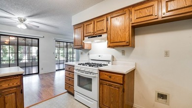 Come home to this charming house nestled in the woods on over an - photo 21