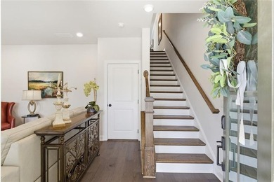 Elevated Living in Gated Waterside | Rare 3-Story Townhome with - photo 4