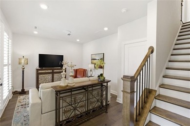 Elevated Living in Gated Waterside | Rare 3-Story Townhome with - photo 5