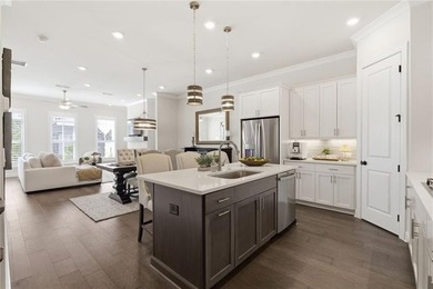 Elevated Living in Gated Waterside | Rare 3-Story Townhome with - photo 6
