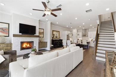 Elevated Living in Gated Waterside | Rare 3-Story Townhome with - photo 8