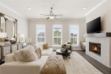 Elevated Living in Gated Waterside | Rare 3-Story Townhome with - photo 9