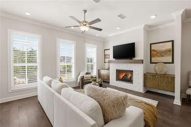 Elevated Living in Gated Waterside | Rare 3-Story Townhome with - photo 10