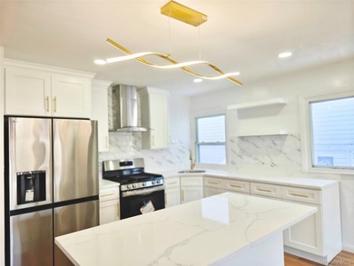 Beautifully renovated detached single-family home located in the - photo 9