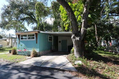 Adorable updated 2-bedroom 1-bath manufactured home nestled in a - photo 3
