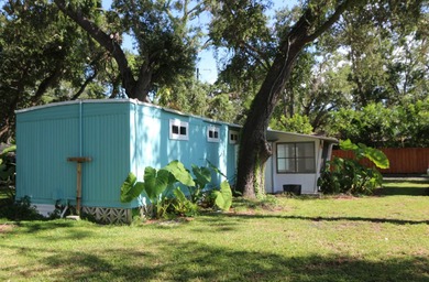 Adorable updated 2-bedroom 1-bath manufactured home nestled in a - photo 8