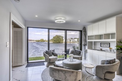 Wake up to panoramic Intracoastal views in this beautifully