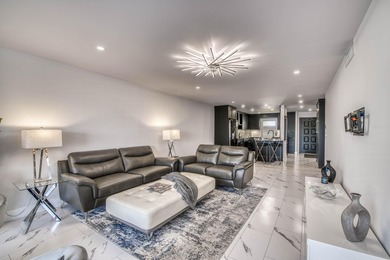 Wake up to panoramic Intracoastal views in this beautifully