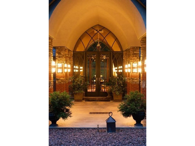 Nestled on approximately 8 private, gated acres, this - photo 2