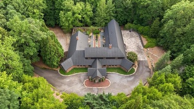 Nestled on approximately 8 private, gated acres, this - photo 4