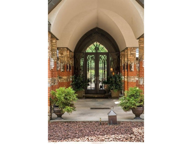 Nestled on approximately 8 private, gated acres, this - photo 6