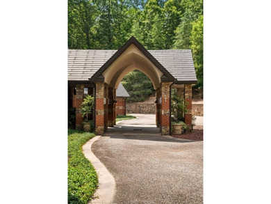 Nestled on approximately 8 private, gated acres, this - photo 7