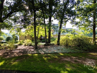 The most stunning home on the most stunning lot in Jennings Mill - photo 2