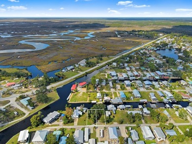 Escape to the coastal charm of Suwannee, Florida with this - photo 14