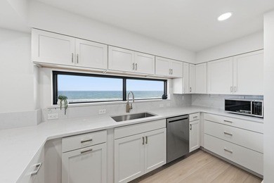 Completely renovated Gulf-front corner unit with panoramic beach - photo 14