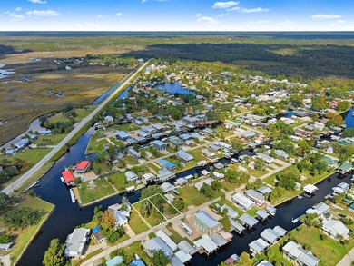 Escape to the coastal charm of Suwannee, Florida with this - photo 15
