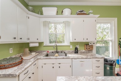 Nestled in the heart of downtown Aiken, this beautifully