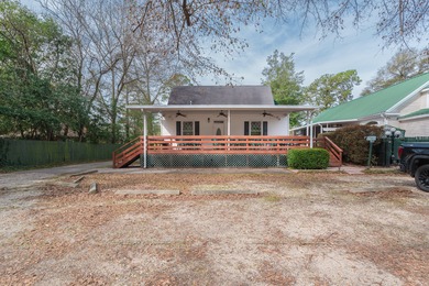 Nestled in the heart of downtown Aiken, this beautifully