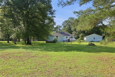 Tucked away on just under an acre in Hope Mills, this - photo 45