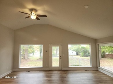 GREAT NEW PRICE ON THIS COMPLETELY RENOVATED LAKE HOUSE!! - photo 2