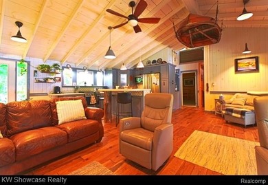 Discover the magic of Walloon Lake living in this exceptional - photo 2