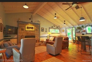 Discover the magic of Walloon Lake living in this exceptional - photo 3