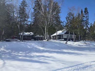 Main camp built in the 1960's with drilled well and septic. A - photo 3