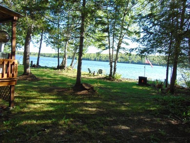 Main camp built in the 1960's with drilled well and septic. A - photo 8
