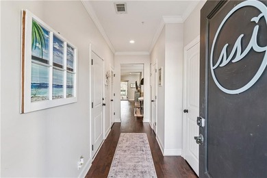 End unit with a large backyard and screened porch in Mariners - photo 4