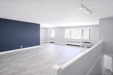 Welcome home to this sun-filled second-floor corner unit in a - photo 1