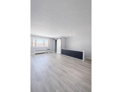 Welcome home to this sun-filled second-floor corner unit in a - photo 3