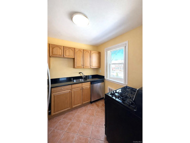 Welcome home to this sun-filled second-floor corner unit in a - photo 6