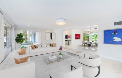 Remodeled 4-bedroom, 2-bath custom-built home featuring an open - photo 1