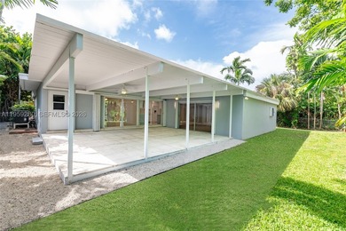 Remodeled 4-bedroom, 2-bath custom-built home featuring an open - photo 4