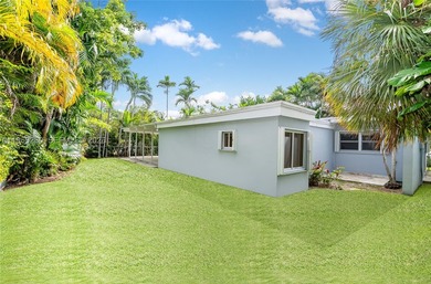 Remodeled 4-bedroom, 2-bath custom-built home featuring an open - photo 5