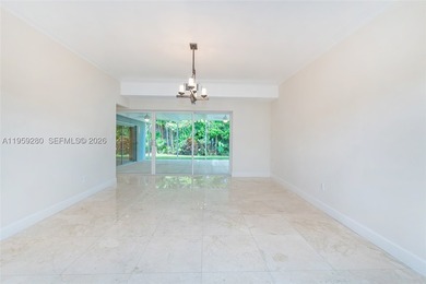 Remodeled 4-bedroom, 2-bath custom-built home featuring an open - photo 7