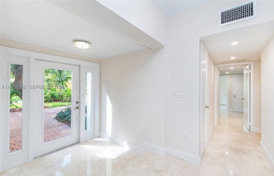 Remodeled 4-bedroom, 2-bath custom-built home featuring an open - photo 10