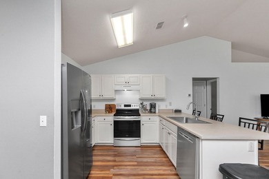 This charming brick home delivers a warm, functional layout - photo 11