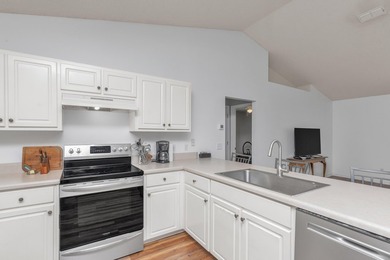 This charming brick home delivers a warm, functional layout - photo 14