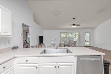 This charming brick home delivers a warm, functional layout - photo 15
