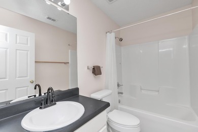 This charming brick home delivers a warm, functional layout - photo 24