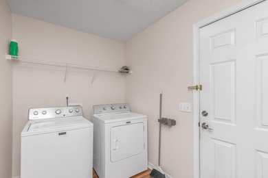 This charming brick home delivers a warm, functional layout - photo 26