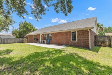 This charming brick home delivers a warm, functional layout - photo 34