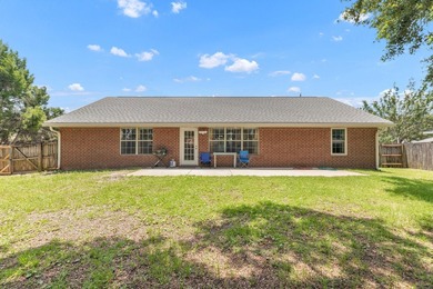 This charming brick home delivers a warm, functional layout - photo 35