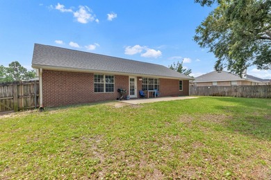 This charming brick home delivers a warm, functional layout - photo 36