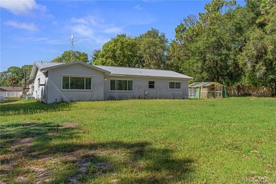 Nestled on approximately 1.6 acres in Homosassa, this charming - photo 26