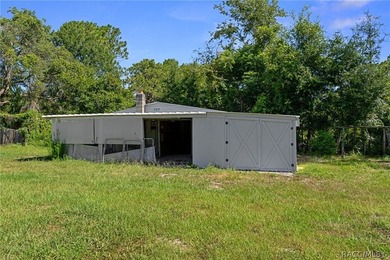 Nestled on approximately 1.6 acres in Homosassa, this charming - photo 31