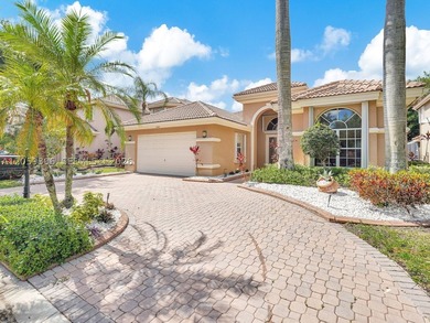 Discover incredible value in prestigious Heron Bay! This - photo 1