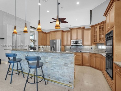 Discover incredible value in prestigious Heron Bay! This - photo 3