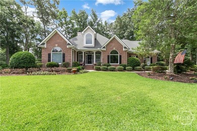 Experience timeless elegance at 2 Hickory Grove Way, a stately - photo 1